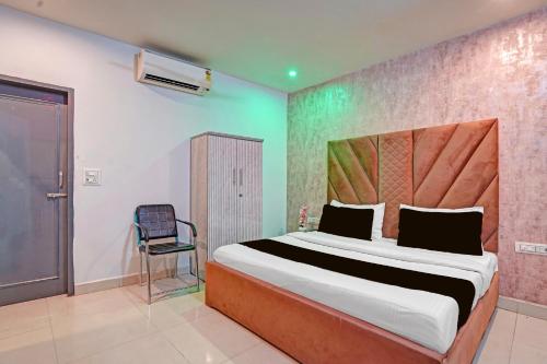 Postel nebo postele na pokoji v ubytování Hotel O Ace