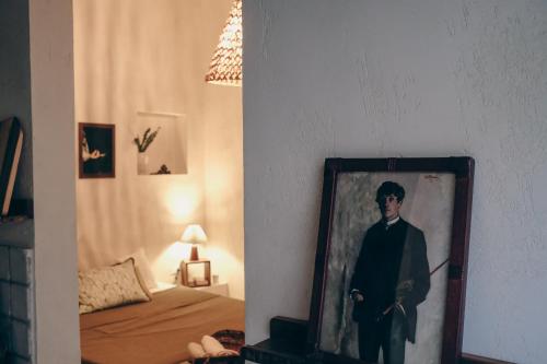 Postel nebo postele na pokoji v ubytování L'Ulivo e il Melograno - Mediterranean Studios