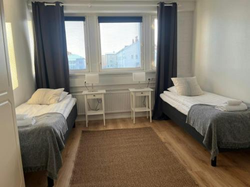 Ένα ή περισσότερα κρεβάτια σε δωμάτιο στο Spacious Apartment for 4 with Sauna