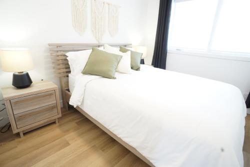 Un pat sau paturi într-o cameră la Loup