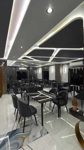 Coin salon dans l'établissement Marigold hotel and restaurant