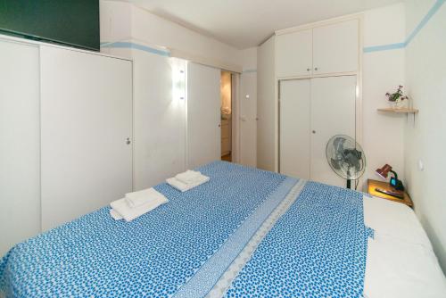 En eller flere senge i et værelse på WELCS APARTAMENTO 293 EMP en el centro