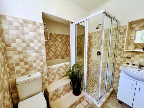 Koupelna v ubytování Grey Pearl at Strand