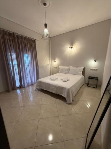 En eller flere senge i et værelse på T-Book365 Green