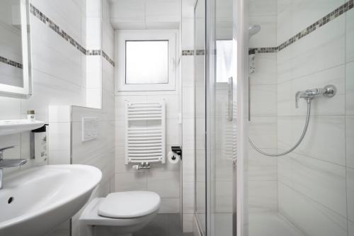 Koupelna v ubytování Sophien Hotel