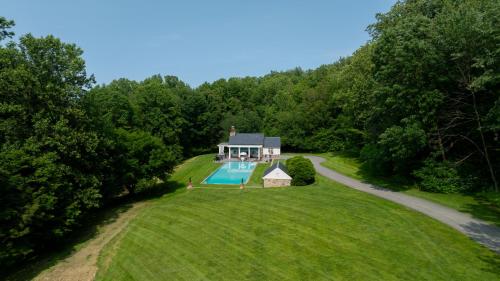 an aerial view of a house with a swimming pool at Pool Cottage at Roundtop Estate couples oasis in Wrightsville
