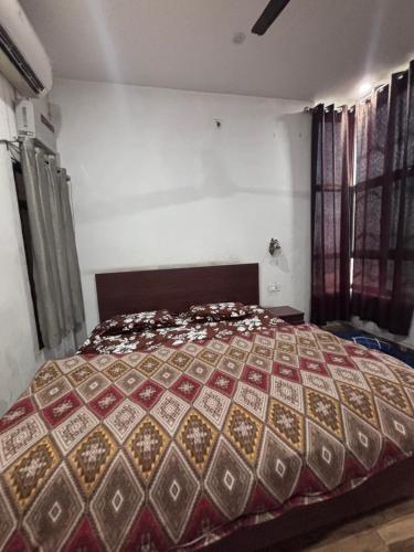 Postel nebo postele na pokoji v ubytování Shumba home stay