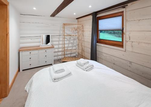 Ένα ή περισσότερα κρεβάτια σε δωμάτιο στο St Andrews Lakes