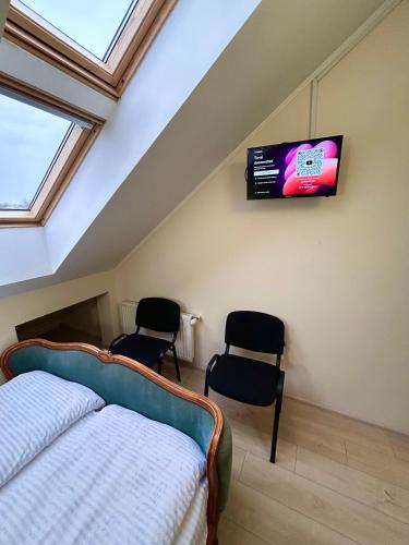 Televisyen dan/atau pusat hiburan di Hotel Sofia