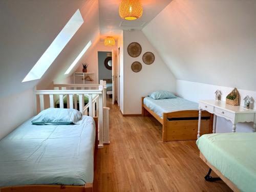 Postel nebo postele na pokoji v ubytování Maison spacieuse et lumineuse