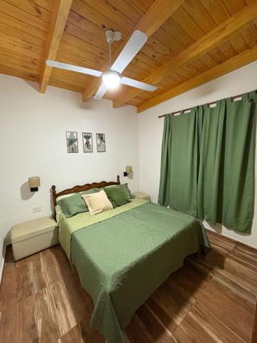 En eller flere senge i et værelse på Ideal para parejas en Anisacate