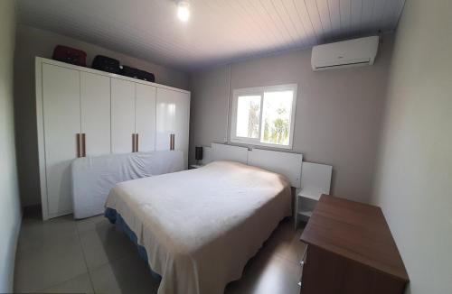 Postel nebo postele na pokoji v ubytování Casa Finger novo á 800m do Núcleo de casas Enxaimel da Adoma e do Centro os anfitriões residem ao lado