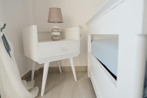 Ένα ή περισσότερα κρεβάτια σε δωμάτιο στο Agapi