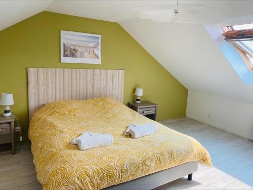 Postel nebo postele na pokoji v ubytování Bord de mer