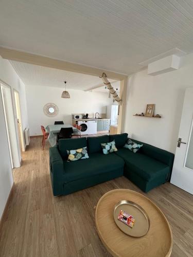 Posezení v ubytování La Parenthèse de la Presqu'île - Beach - Bikes