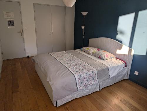 Postel nebo postele na pokoji v ubytování Chez Nicolas Marseille 13009