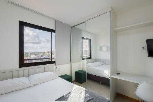 Postel nebo postele na pokoji v ubytování SOA - Condomínio a 300m da Praia dos Artistas em Salvador