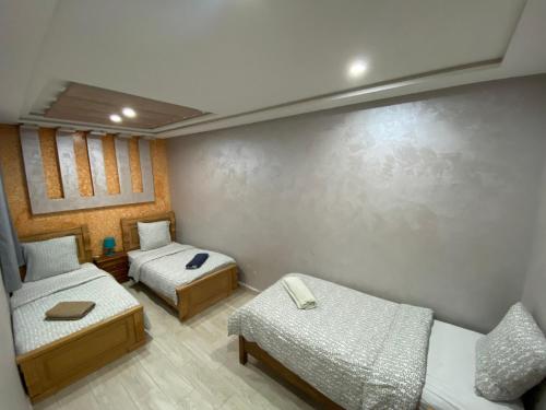 Ein Bett oder Betten in einem Zimmer der Unterkunft Abrid Surf Hostel