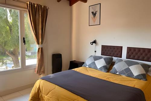 Ένα ή περισσότερα κρεβάτια σε δωμάτιο στο Copos de Nieve