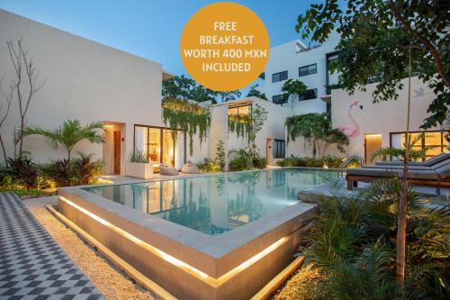 La alberca dentro o cerca de Collection O Faisano Boutique Luxury Hotel, Tulum Beach