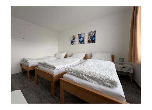 Postel nebo postele na pokoji v ubytování Ubytování V Panské zahradě