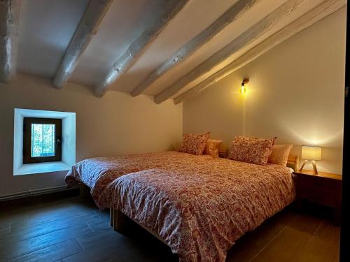 Postel nebo postele na pokoji v ubytování Casa Fuente Rivera