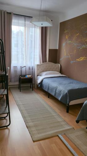 Ένα ή περισσότερα κρεβάτια σε δωμάτιο στο My Bed Bergedorf by Gugu