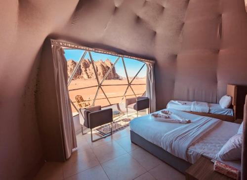 Postel nebo postele na pokoji v ubytování Bedouin bunch camp