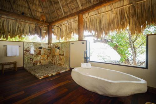 Vannituba majutusasutuses All-Inclusive Sapodilla Private Island