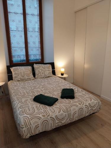 Llit o llits en una habitació de Kait location