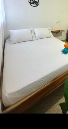 Ένα ή περισσότερα κρεβάτια σε δωμάτιο στο Hotel bosque blue