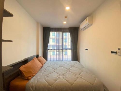 Postel nebo postele na pokoji v ubytování The Central Escape Phuket