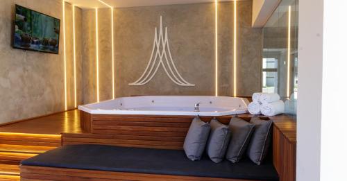 Μια τηλεόραση ή/και κέντρο ψυχαγωγίας στο Marsala Apart Hotel