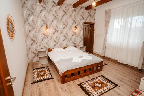 Postel nebo postele na pokoji v ubytování Cabana Iriss