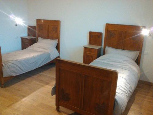 Ein Bett oder Betten in einem Zimmer der Unterkunft La Casa dei Lumi