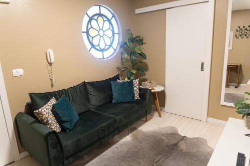 Posezení v ubytování Apto Pet Friendly com Garagem no Centro