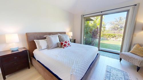 Voodi või voodid majutusasutuse PiH: Dancing Honu Walk to the Beach Bikes and Beach Gear toas