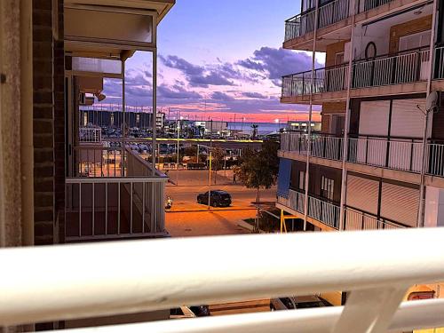 a view of a city from a balcony of a building at Santa Pola port, sea view, vista del mar in Santa Pola