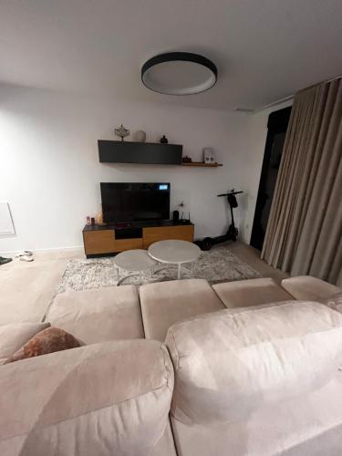 Giường trong phòng chung tại Kristiansand Apartament