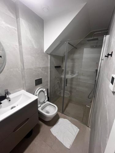 Phòng tắm tại Kristiansand Apartament