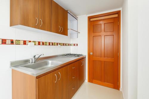 Η κουζίνα ή μικρή κουζίνα στο El Velero Apartamentos By DANP