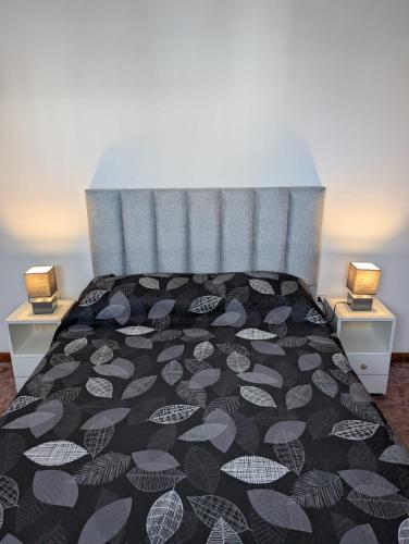 En eller flere senge i et værelse på Duplex en Costa Azul cerca del mar