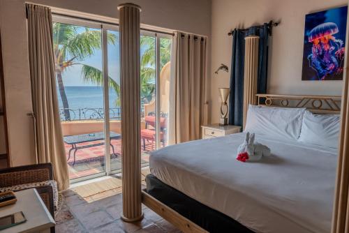 Postel nebo postele na pokoji v ubytování Caribe Tesoro