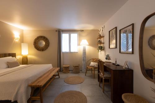 Ένα ή περισσότερα κρεβάτια σε δωμάτιο στο Orient Bay, Paolina Beach, sur le plage, Grand 2 chambres