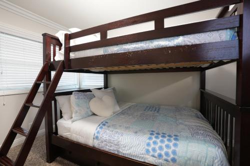 a bedroom with two bunk beds with a bed at Destination #06 in Anaheim