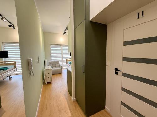 Postel nebo postele na pokoji v ubytování Apartament Szałwiowa