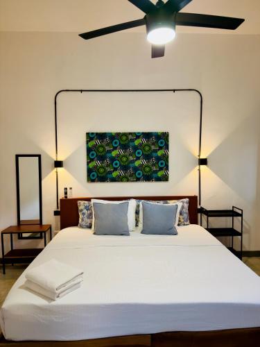 Postel nebo postele na pokoji v ubytování Casa Lluavi - Caliope