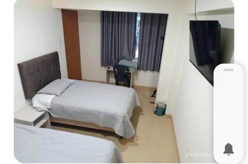 Hotel Rodilla客房内的一张或多张床位