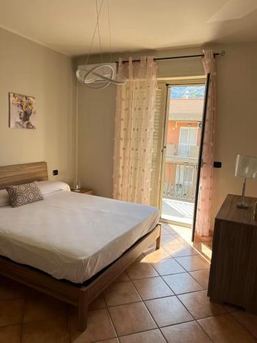 Postel nebo postele na pokoji v ubytování Appartamento Gardenie Vista Mare Relax