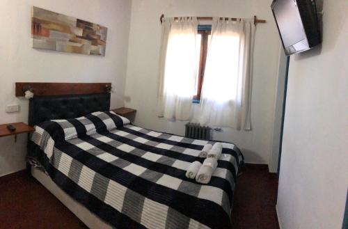 Postel nebo postele na pokoji v ubytování CASONA Malva del Rio